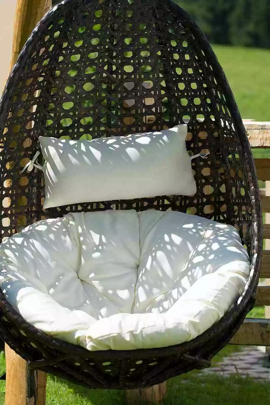 Black wicker hanging chair for the garden