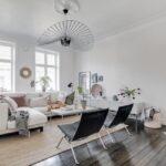 living room with dark brown floor with carpets