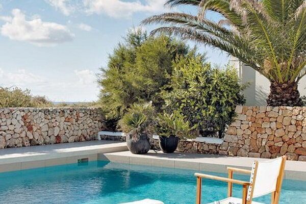Stone walls around the pool