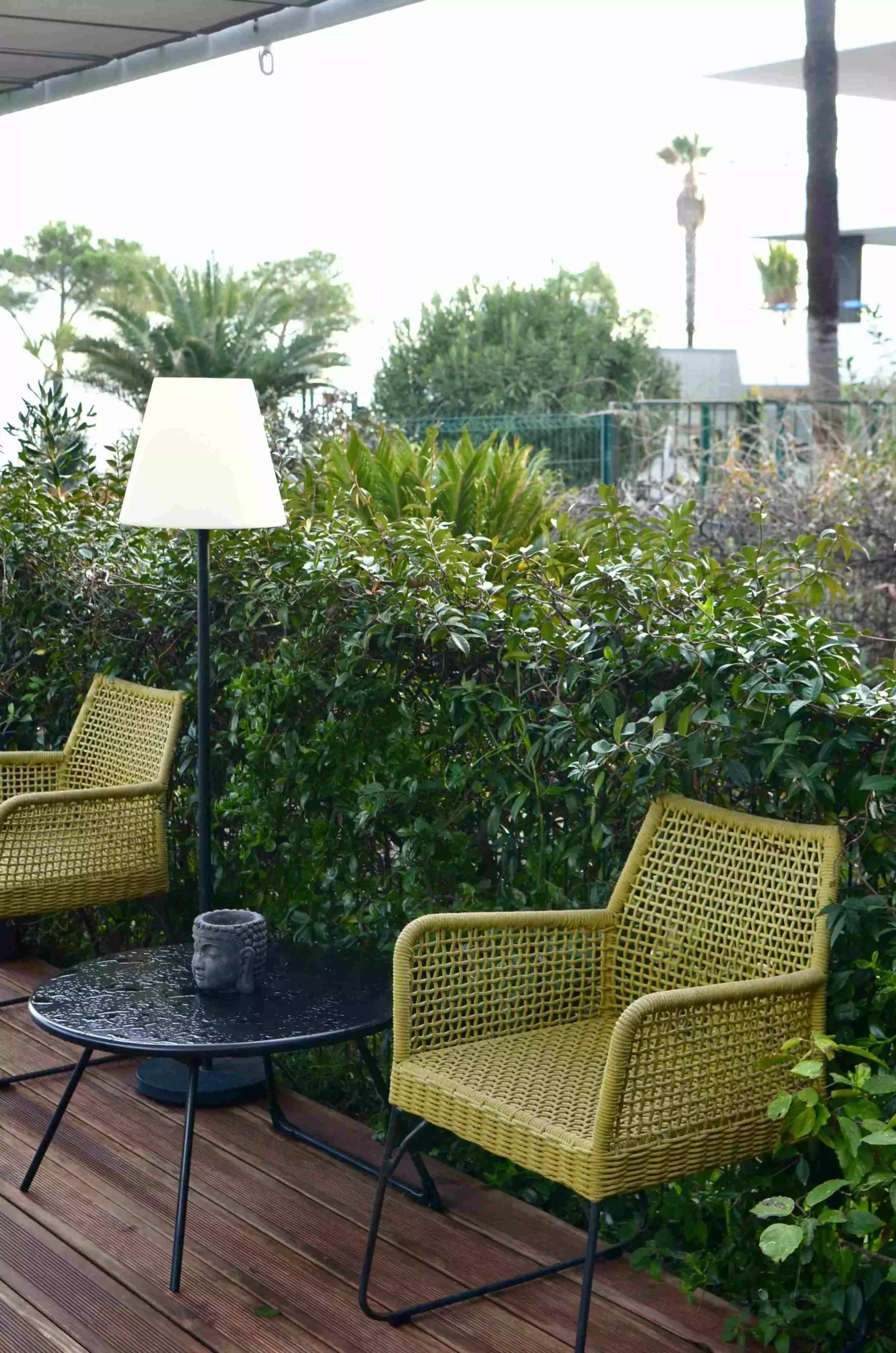 green wicker chairs for the terrace or garden
